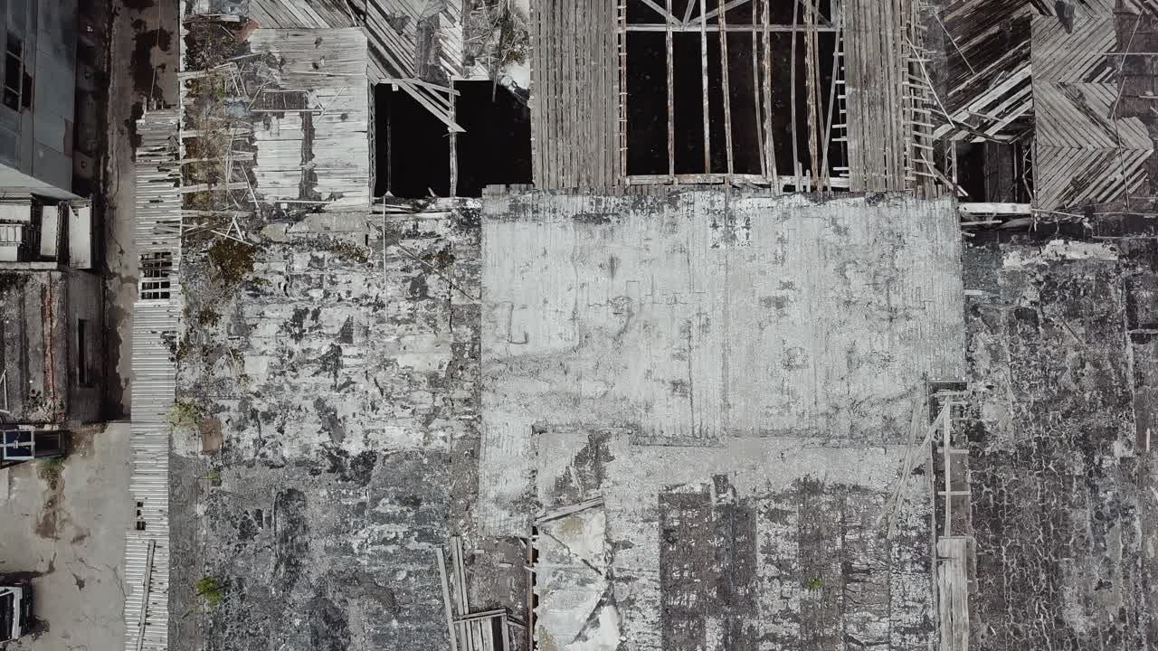 Ruined roof of an old abandoned factory. Aerial view