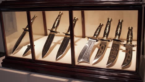 antique knives in display case
