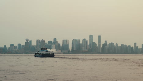 Sea-bus-sailing-towards-Vancouver-downtown-on-cloudy-day