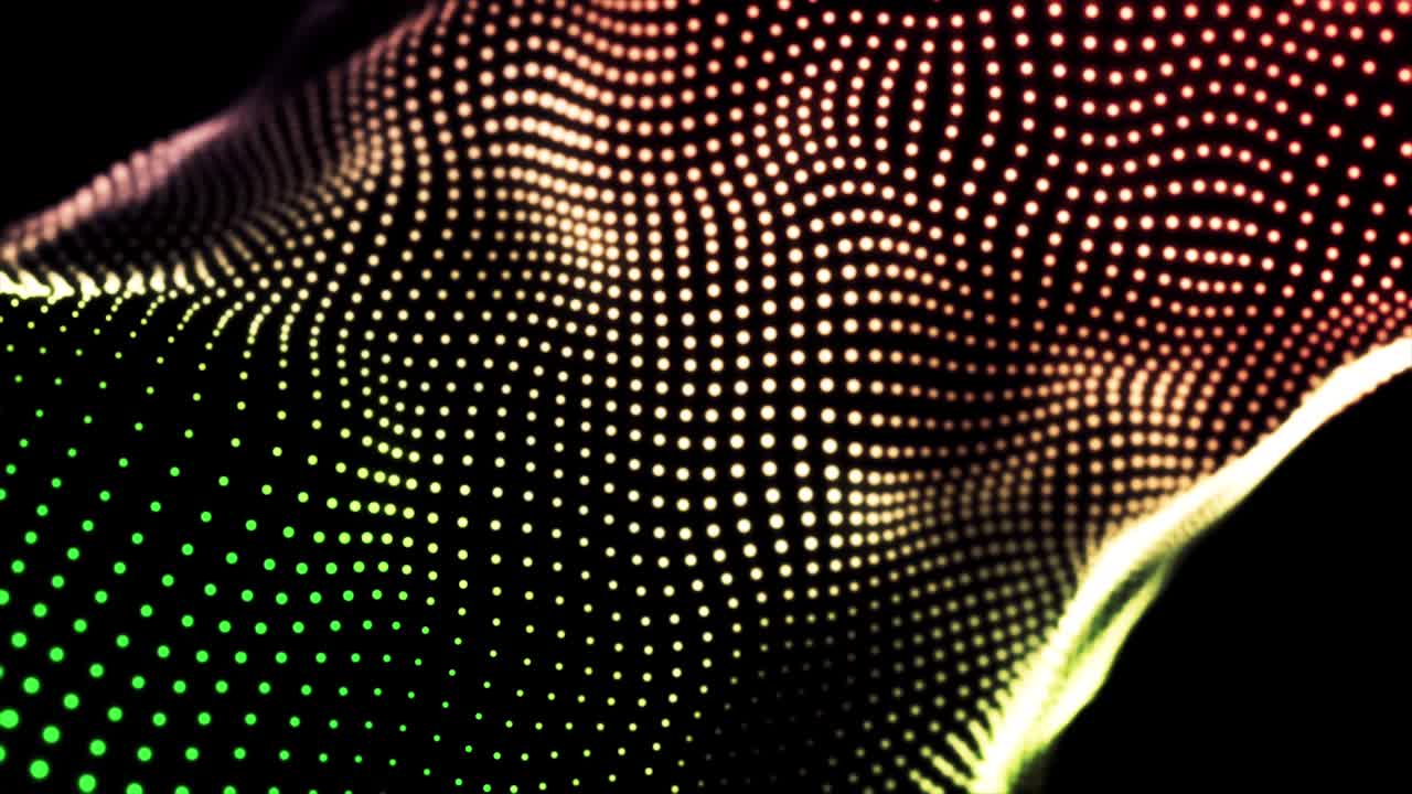 gradiente de bucle ondulante con textura punteada con partículas borrosas brillantes. animación. pequeños círculos verdes, rojos y amarillos que fluyen sobre un fondo negro, tela abstracta