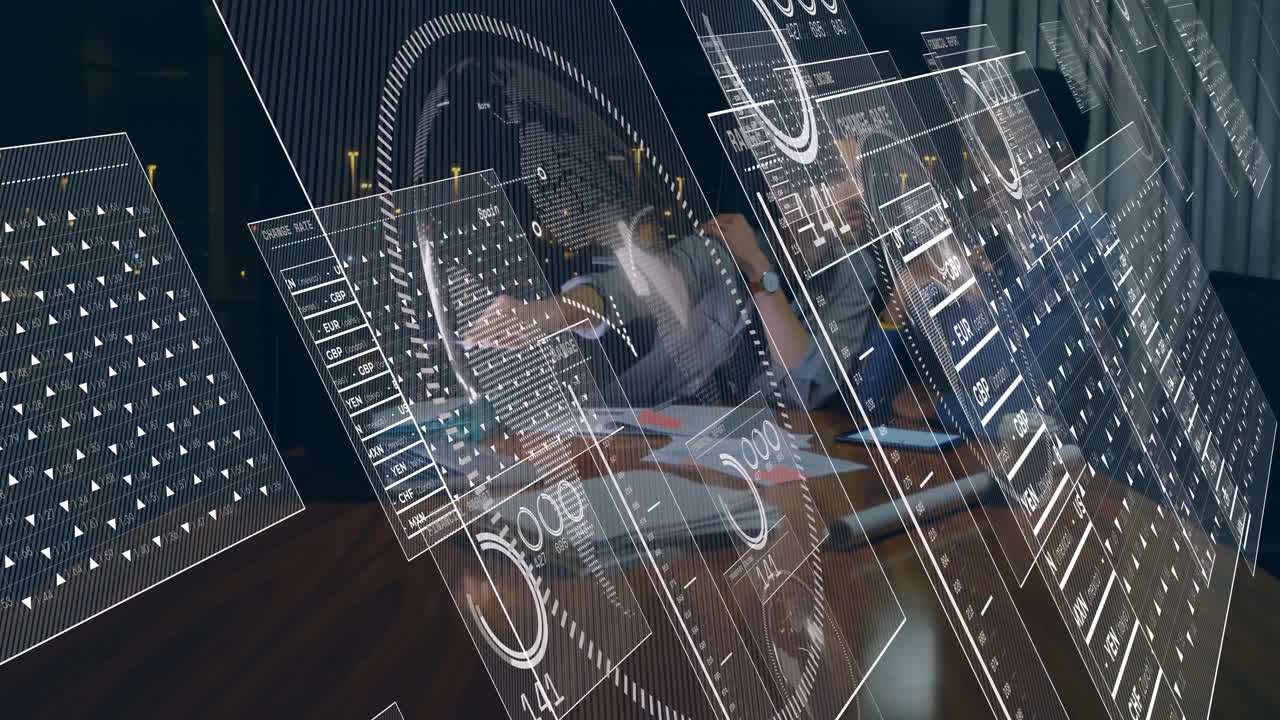 Animation of data analytics overlaying people working at office desk in school