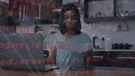 animation of data processing over woman using laptop