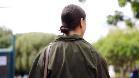 back, walking and business woman at park