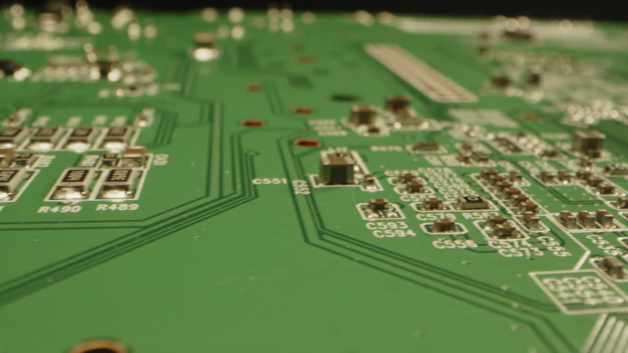 Beautiful macro of a clean circuit board in a dark studio