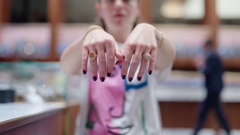 a lady showing a full jewellry