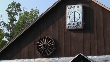 a brown barn with a peace sign in woodstock new york 1