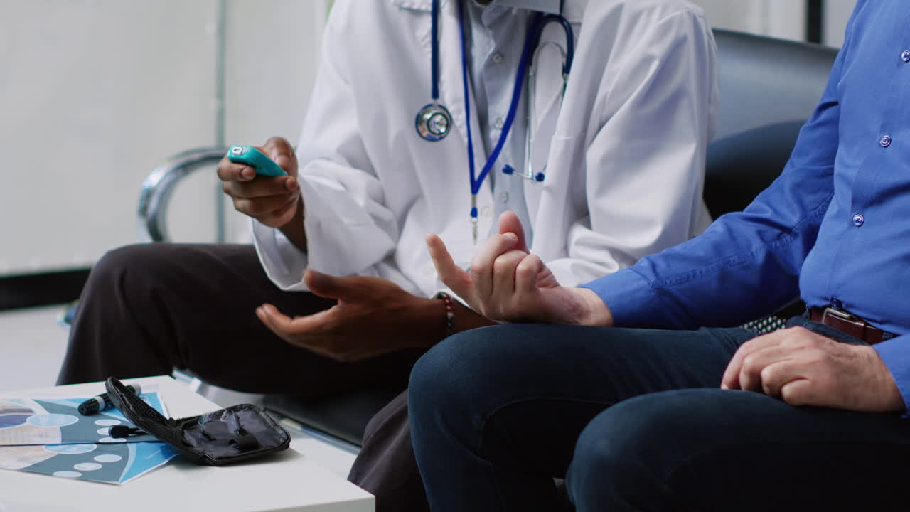 Doctor Examining Patient with Pulse Oximeter