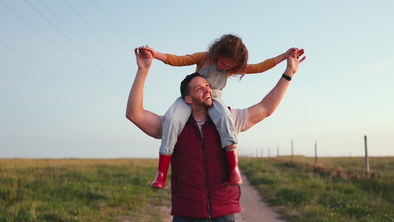 Happy family, father and child walking on a farm