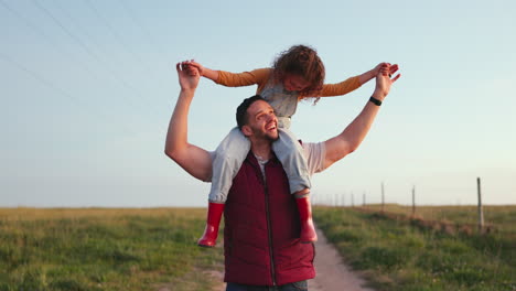 Happy-family,-father-and-child-walking-on-a-farm