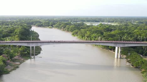 dolly in view of gabkhan bridge as traffic flows on a clear day