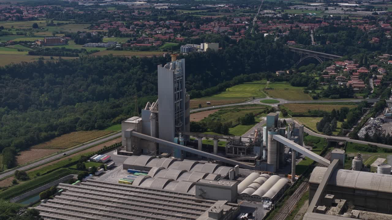 Cement factory in the area of Bergamo, Italy. Construction materials. Aerial drone video