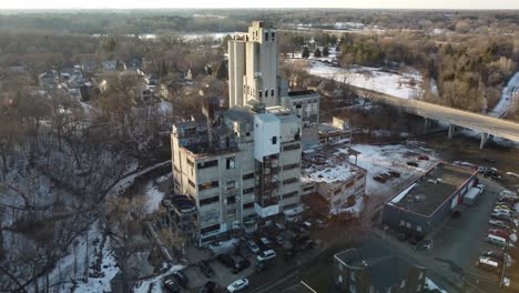 drone approaching abandoned grain mill