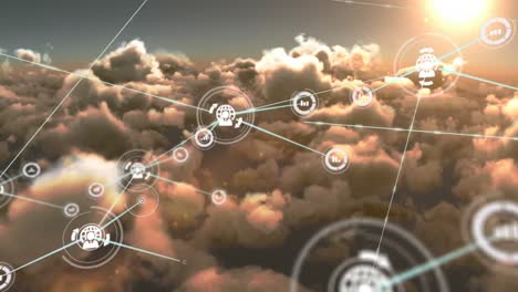 animation of network of digital icons against clouds and shining sun in the sky