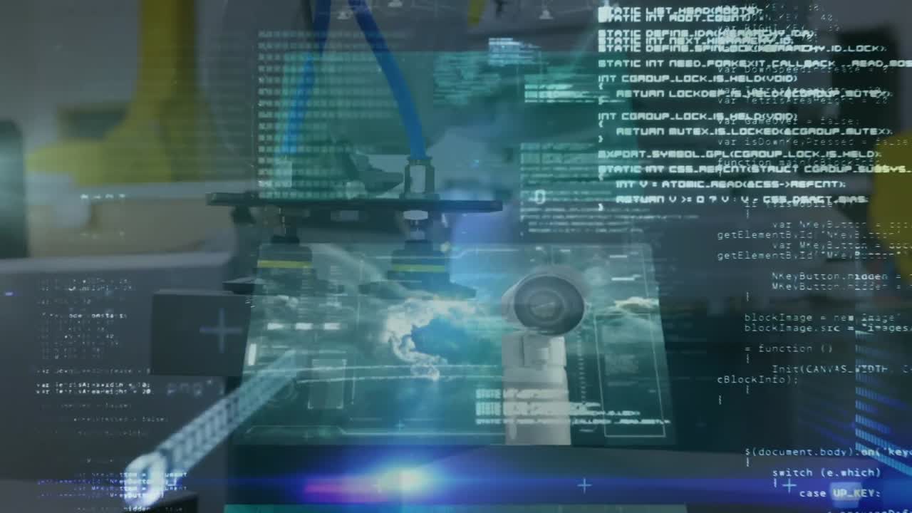 Animation of screens with data processing over close up of machinery at the factory