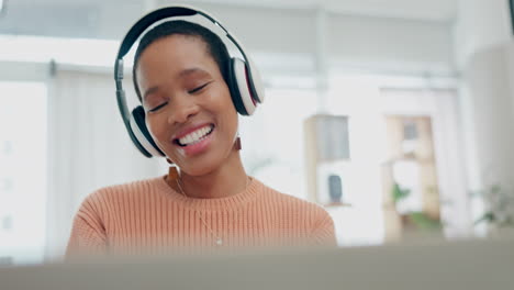 Remote-work,-laptop-or-black-woman-in-headphones