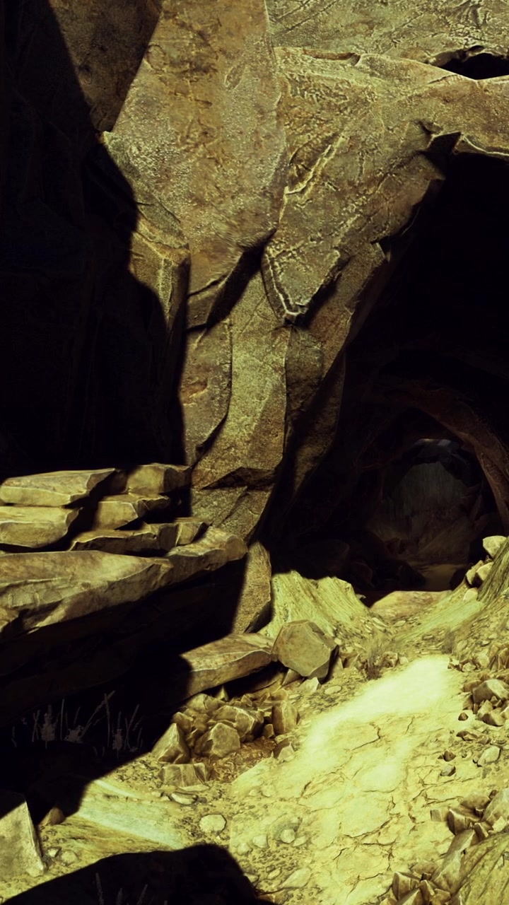 Esplorando una grotta rocciosa con superfici irregolari e zone d'ombra durante il giorno.
