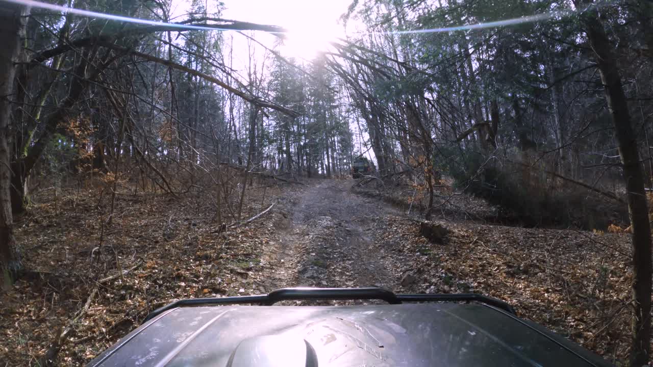 Off-road in stunning forest, muddy roads, sunlights, leafs and broken trees - GoPro 4k view