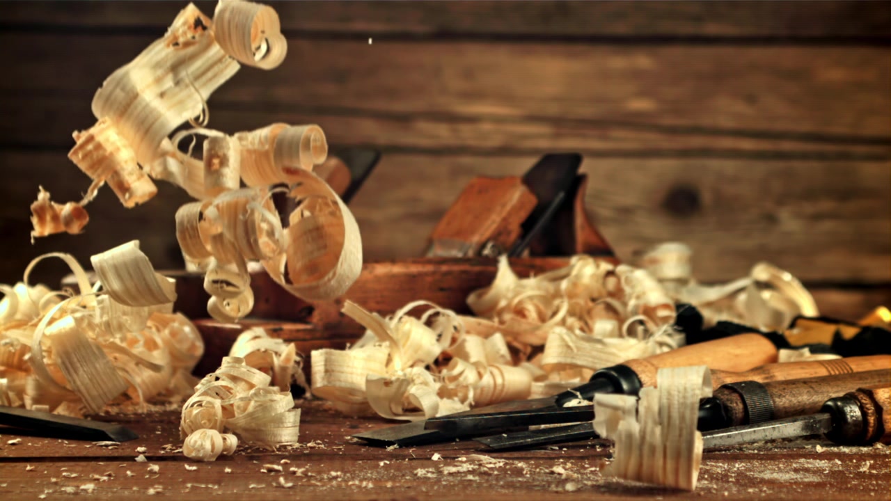 Wood Shavings Falling on Workbench with Traditional Woodworking Tools