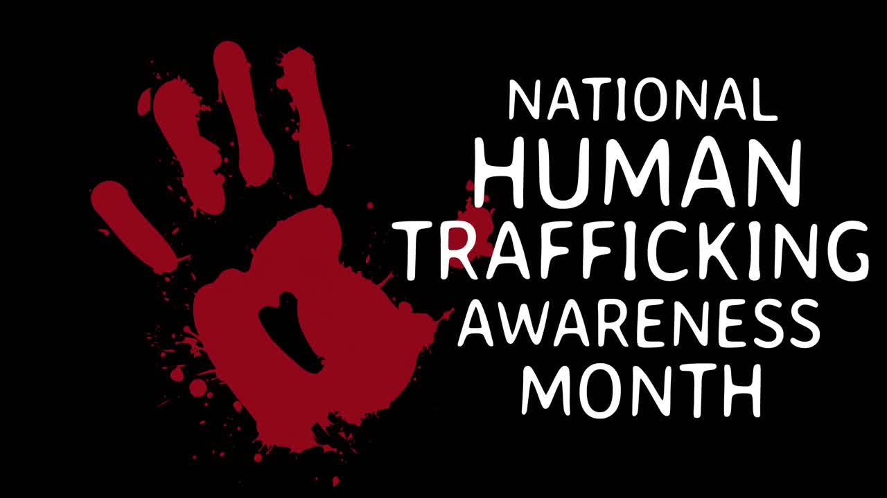 Animation of stop human trafficking text and red hand on black background