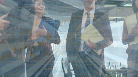 animation of data processing and graphs over happy caucasian businesspeople looking at camera