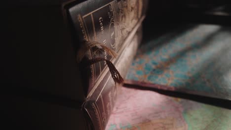 sunlight falls on hard backed literature books in home library close-up