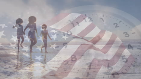 animation of flag of america and clock over african american mother and children walking on beach