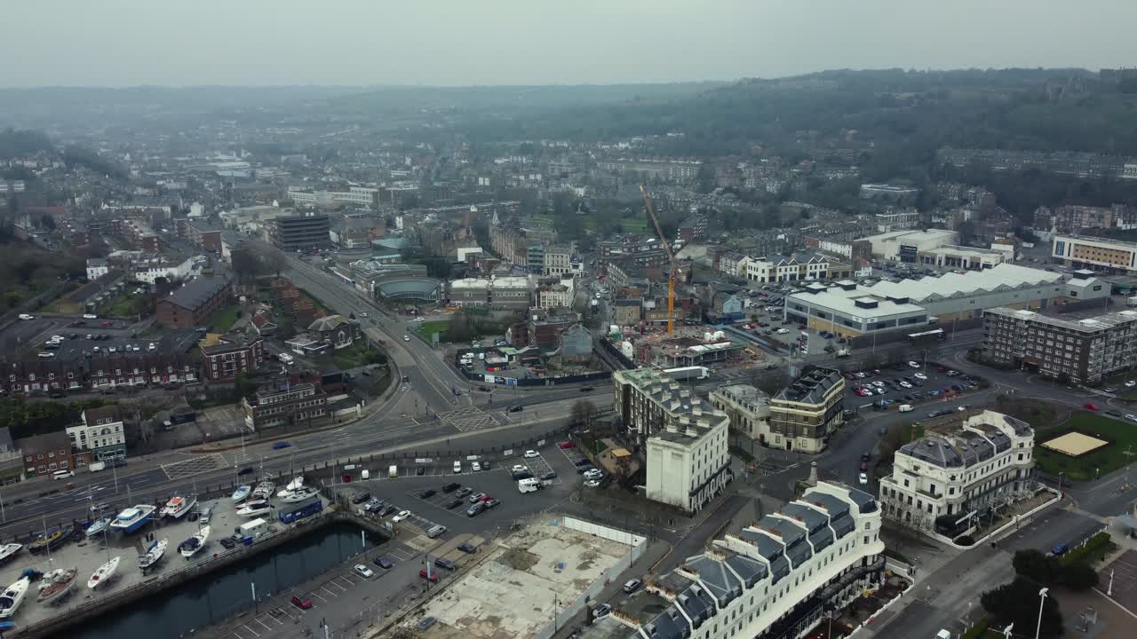 Aerial View of Urban Cityscape with Construction and Waterfront