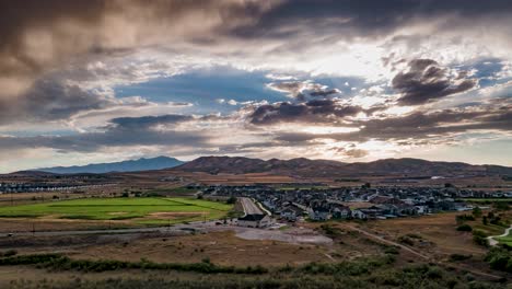 a picturesque at the foot of a mountain at sunset - moving aerial hyperlapse