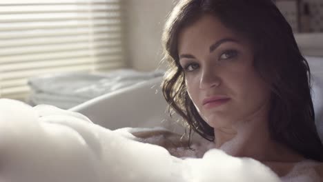 woman relaxing in a bubble bath
