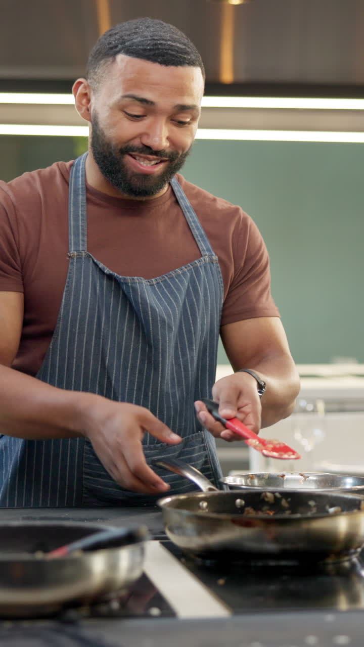 Man cooking food in kitchen