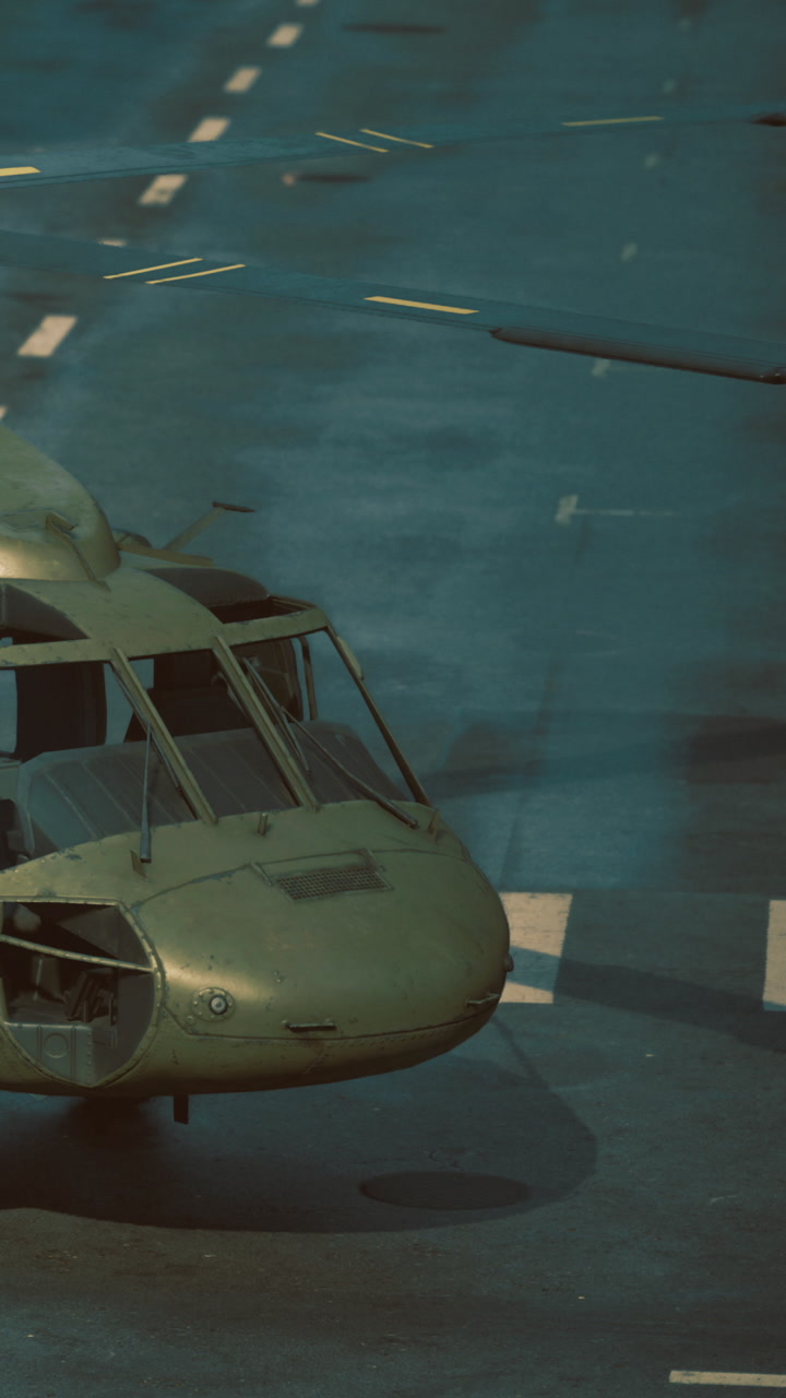 Helicopter on runway showing parts and details of military equipment