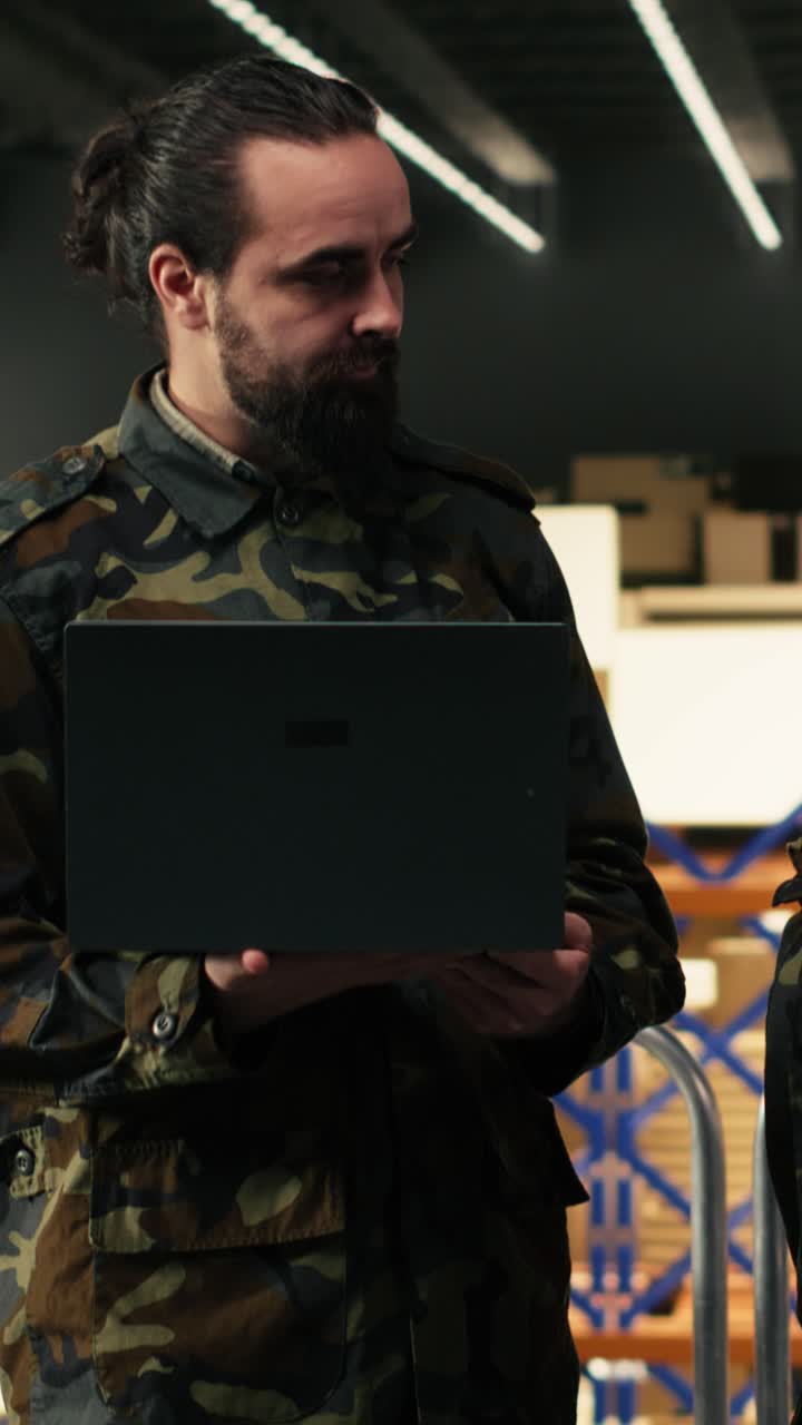Vertical Video Diverse military officers working in storage warehouse and managing cargo