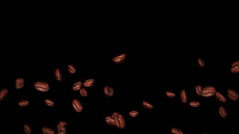 flying many coffee beans on black background. caffeine drink, breakfast, aroma. 3d animation of roasted coffee beans rotating. loop animation.