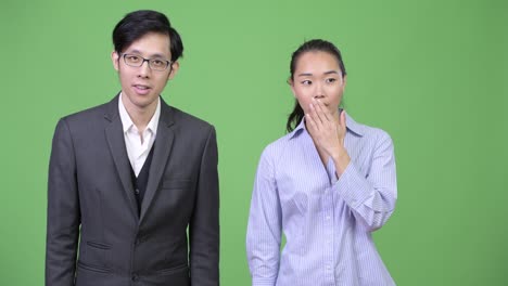 young asian business couple together