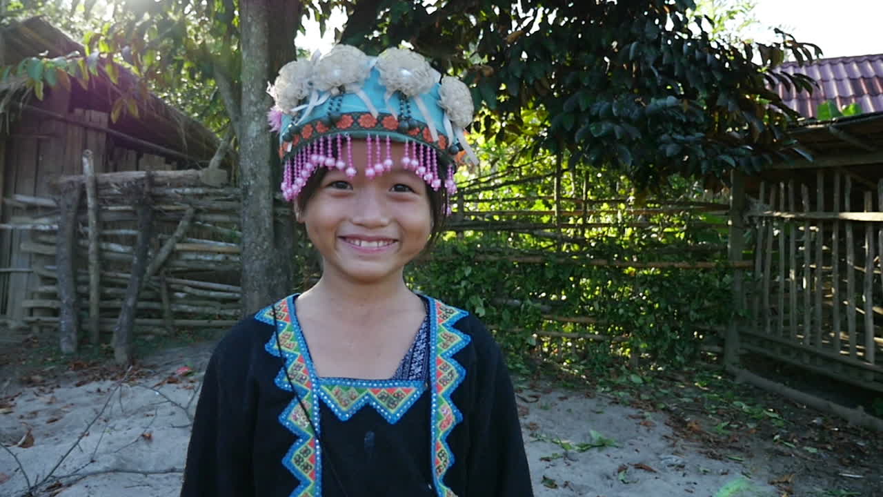 Smiling Girl in Traditional Southeast Asian Clothing