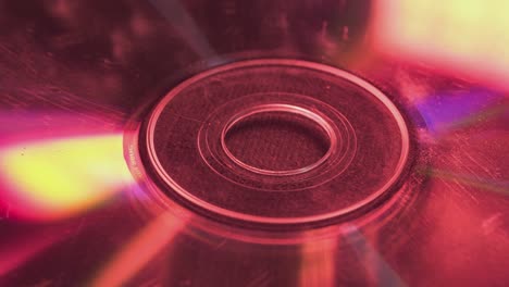 colorful lights reflecting on surface of dvd