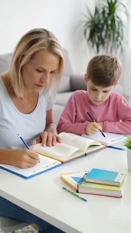 mother assisting her children with their homework