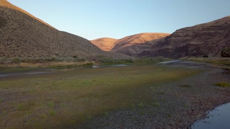 aerial view of sunrise on the john daycriver in otton wood canyon, oregon