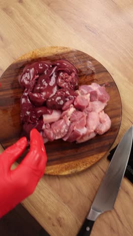 preparing raw liver and chicken