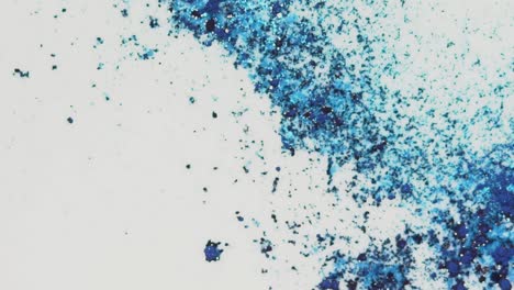 blue glitter splashes on white background