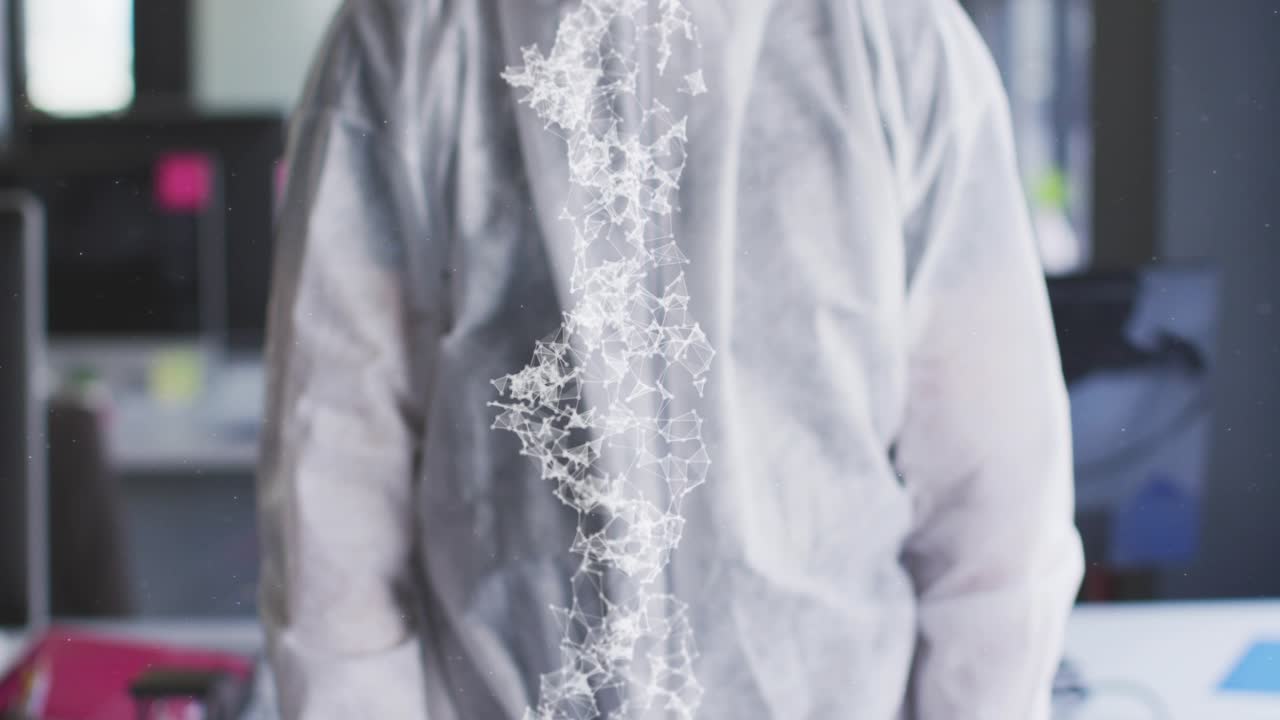 Man in suit pressing nozzle, releasing mist forming glowing particle stream for office sanitizing