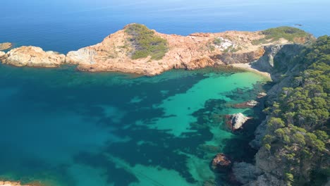 sa riera, along the costa brava, presents an idyllic setting where upscale tourism converges with the rustic beauty of fisherman's cabins