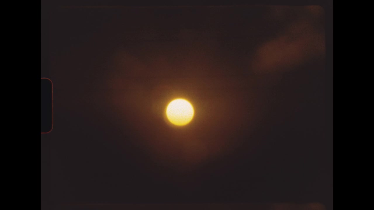 Bright Sun Shining in Dark Sky
