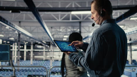 data center engineer using ai on tablet to help clients resolve hosting problems