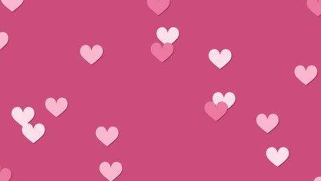 hearts float across pink and green backgrounds