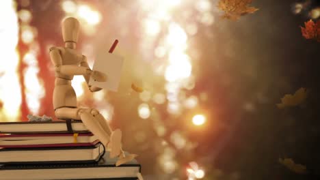 figurine on stack of books against autumn leaf 4k