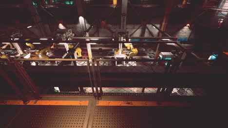 advanced conveyor system in a modern factory with robotic machinery at work