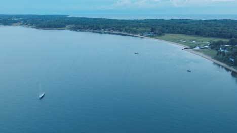 aerial drone shot of orient greenport north fork long island new york before sunrise with ferry and houses