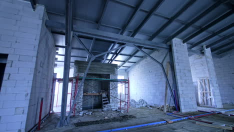 commercial site renovation updates. workers are on-site at a commercial building renovation, surrounded by steel frameworks and construction materials