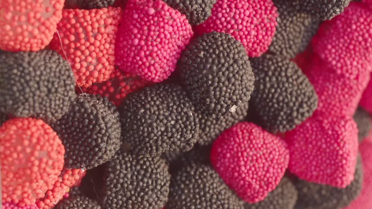 Close-up of assorted red and black jelly candies